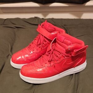 Nike "Air Force 1s" Pink High-Top Sneakers